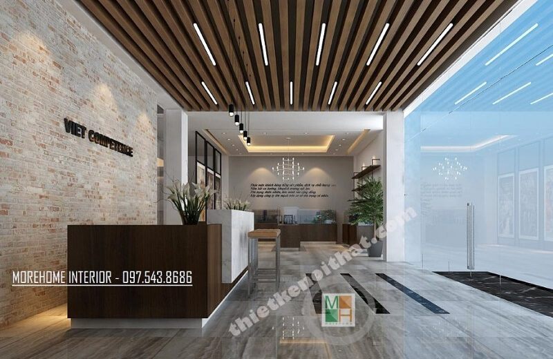 Mẫu thiết kế sảnh lễ tân văn phòng hiện đại sử dụng gạch ốp tường độc đáo cùng với trần gỗ cao cấp để tạo ra ấn tượng mạnh mẽ cho khách hàng.